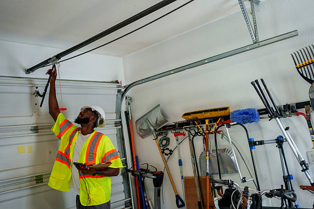 Professional Garage Door Roller Replacement technician working in Mondovi, WI